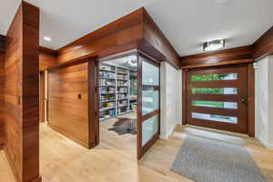 Entryway featuring light wood-type flooring and baseboards