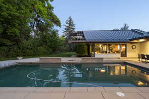 Outdoor pool featuring a patio