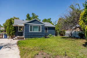 View of front of property featuring roof with shingles