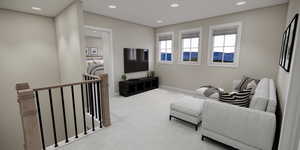 Living area featuring carpet and recessed lighting