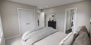 Carpeted bedroom with a closet and recessed lighting