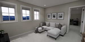 Living area with carpet floors, a mountain view, and recessed lighting