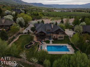View of property location with a mountainous background and a pool area