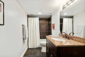 Granite Counter, Tile Bath Enclosure and Flooring, New Lighting