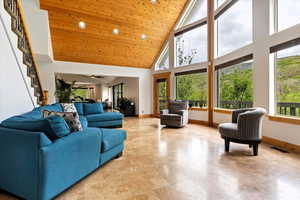 Large Windows, Natural Light, Wood Ceiling and Casing, Entrance to Outside Deck