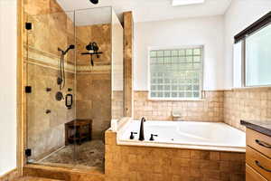 Custom Shower, Jetted Tub, Vaulted Ceilings, Skylights