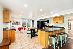 Large Kitchen/Dining Area, New Paint, Appliances Included, Tile Flooring