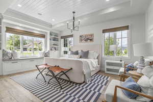 Bedroom featuring light wood-style flooring, multiple windows, a chandelier, wood ceiling, and recessed lighting