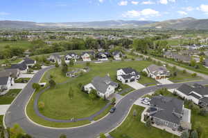 Aerial view of residential area featuring a mountain backdrop