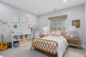 Bedroom featuring carpet floors, recessed lighting, and baseboards