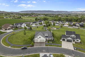 Aerial view of residential area featuring mountains
