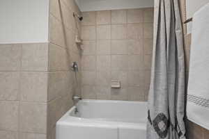 Bathroom featuring shower / bath combo