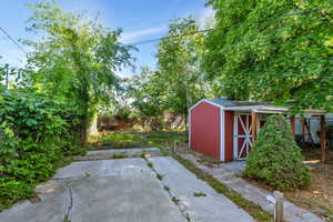View of yard with a patio