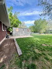View of yard with a patio area