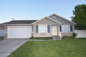 Ranch-style home with concrete driveway, entry steps, a garage, and stucco siding