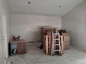 Miscellaneous room featuring unfinished concrete flooring