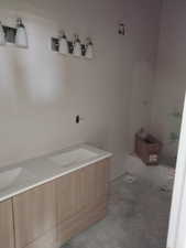 Bathroom featuring double vanity