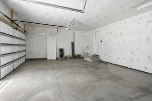 Garage featuring a garage door opener