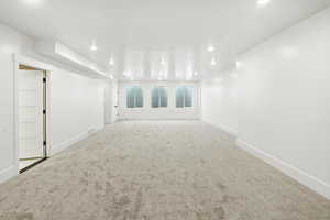 Unfurnished room featuring carpet floors and recessed lighting