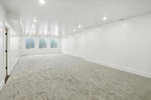 Spare room with carpet flooring and recessed lighting