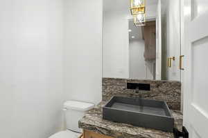 Bathroom with vanity and toilet