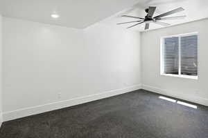 Spare room with ceiling fan and recessed lighting