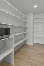 View of large walk-in pantry