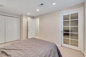 Bedroom with recessed lighting and baseboards