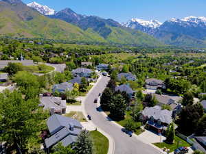 Aerial view of residential area featuring a mountain backdrop