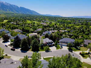 Aerial perspective of suburban area featuring mountains