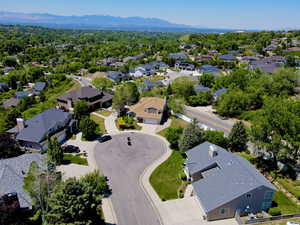 Aerial perspective of suburban area with a mountain backdrop