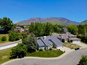 Mountain view featuring nearby suburban area