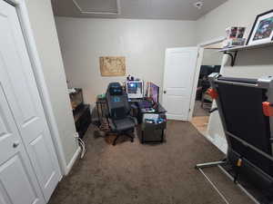 Office with carpet flooring and baseboards