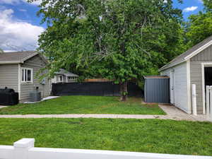 View of yard featuring central AC unit