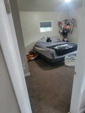 Bedroom featuring carpet flooring
