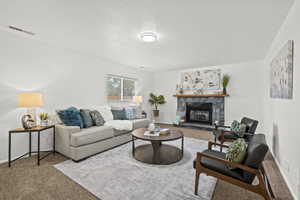 Extra large family room with a wood burning fireplace.