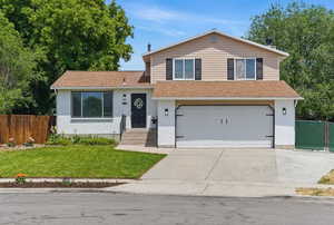 Large cement pad with a two door gate to access the RV parking area in the backyard