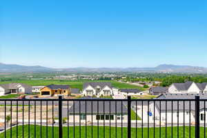 Mountain view featuring nearby suburban area