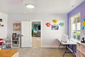 Large bedroom with walk in closet and lots of natural light.