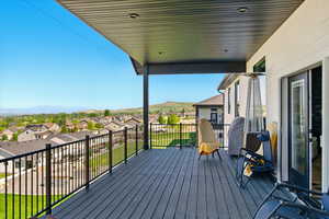 Composit deck with a mountain view and a residential view