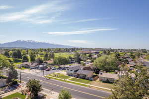 Aerial perspective of suburban area featuring mountains