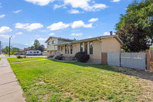 View of front of home featuring a porch and brick siding
