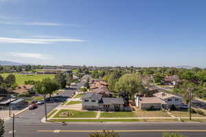 Aerial view of residential area featuring mountains