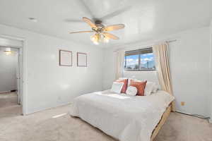 Bedroom featuring carpet flooring and ceiling fan