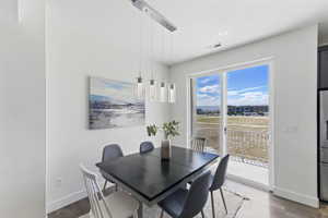 Dining room featuring baseboards and wood finished floors
