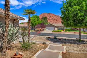 Exquisite view of front yard and Red Mountain.