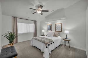Large primary bedroom with vaulted ceilings