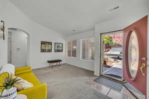 Living room with front door views