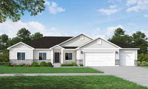 View of front of property featuring stone siding, a garage, driveway, and a front yard