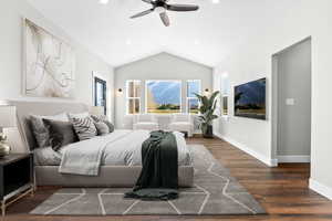 Bedroom featuring wood finished floors, vaulted ceiling, recessed lighting, a ceiling fan, and baseboards